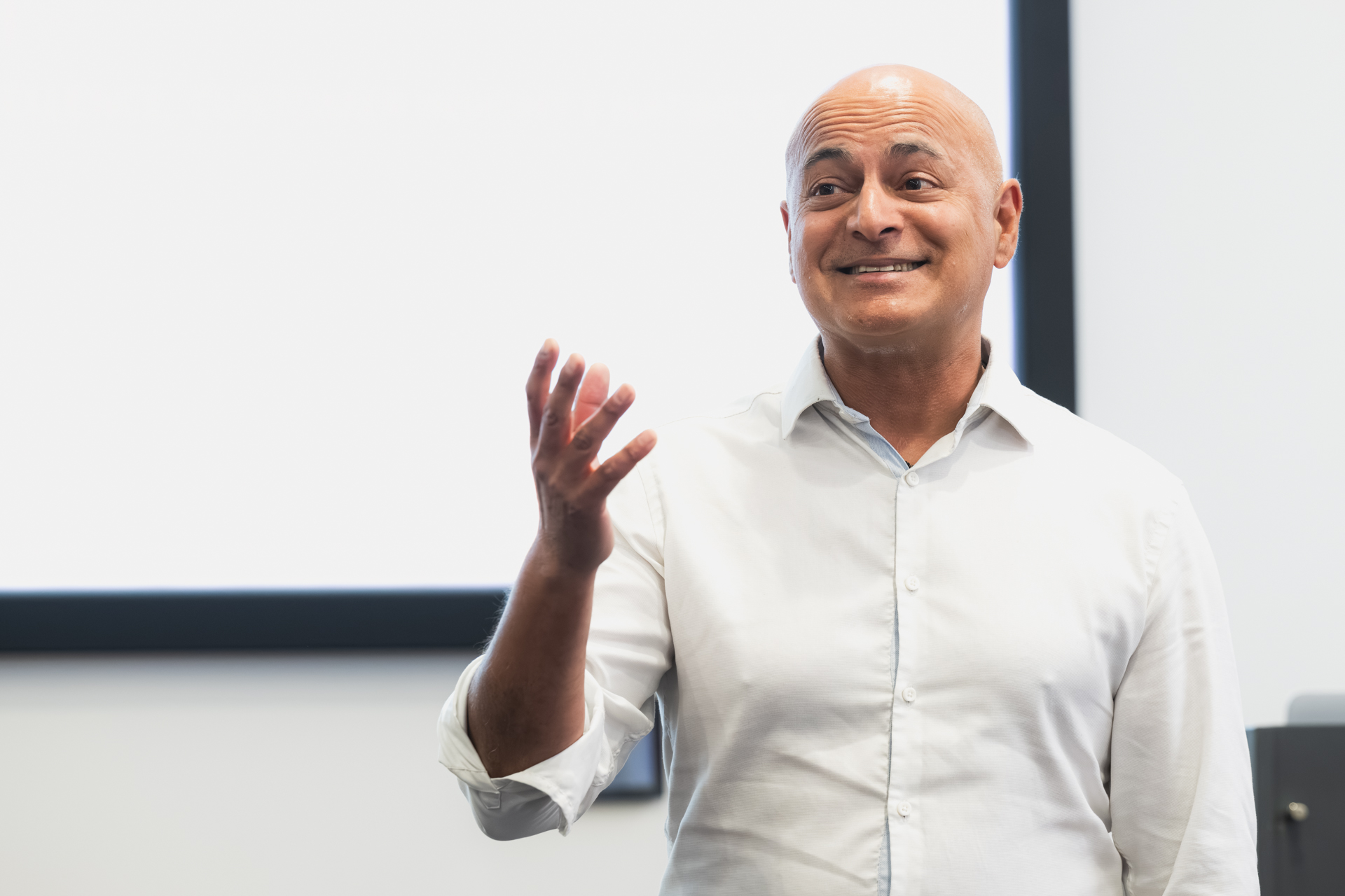 Harry Mirpuri speaking about customer insight at an industry event